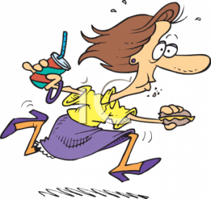 rushing_woman_trying_to_finish_lunch_on_the_run