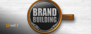 coffee cup with "brand building" in the coffee
