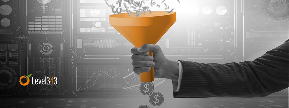 hand of a business person holding a conversion funnel