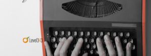 person using a typewriter