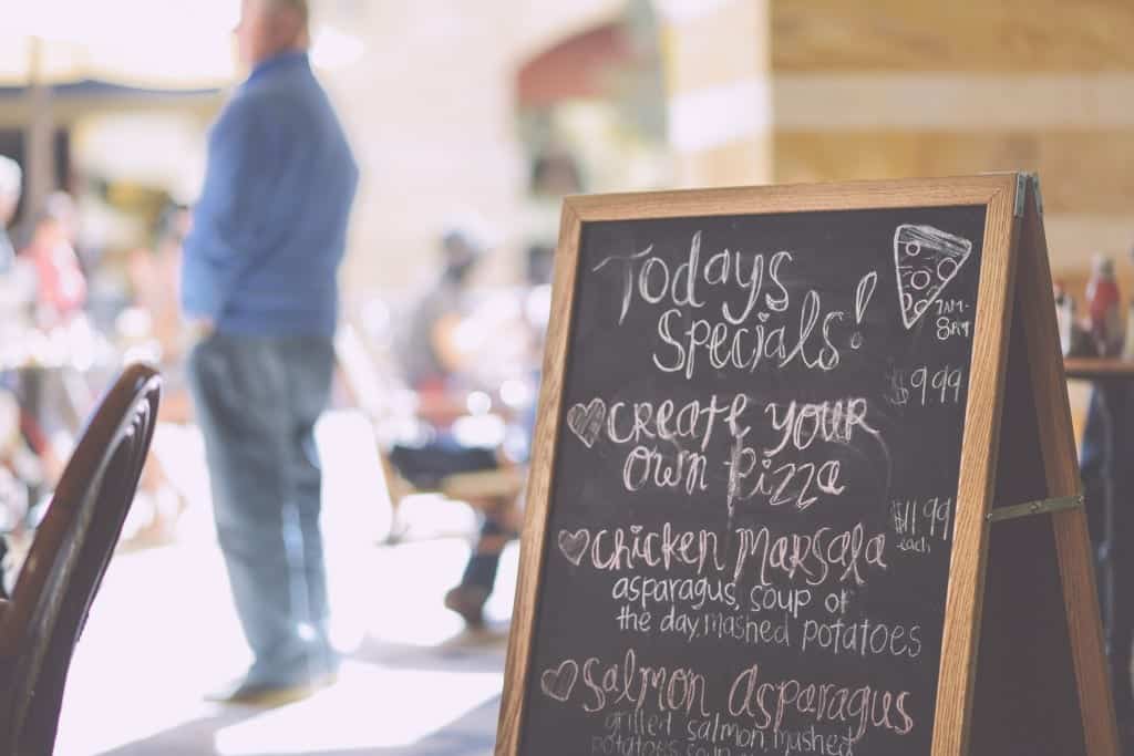 True product placement: a handwritten sign outside of italian marketing