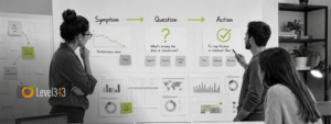 Marketer reviewing black-and-white reporting charts with lime green highlights showing a clear path from data symptoms to decisions.