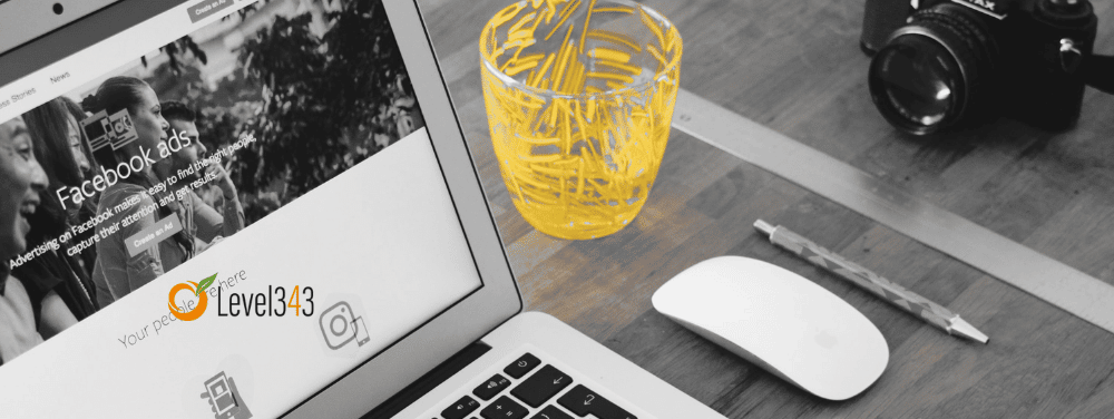 laptop with yellow cup