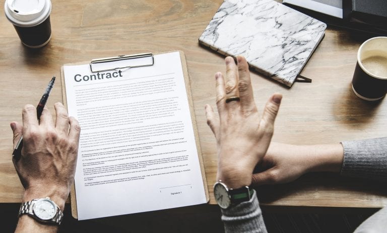 Contract with people's hands in discussions