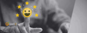 social proof concept - a person touches a smiley face with five stars indicating positive social proof from reviews