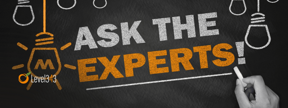 a sign that says "ask the experts" as a concept for topical authority