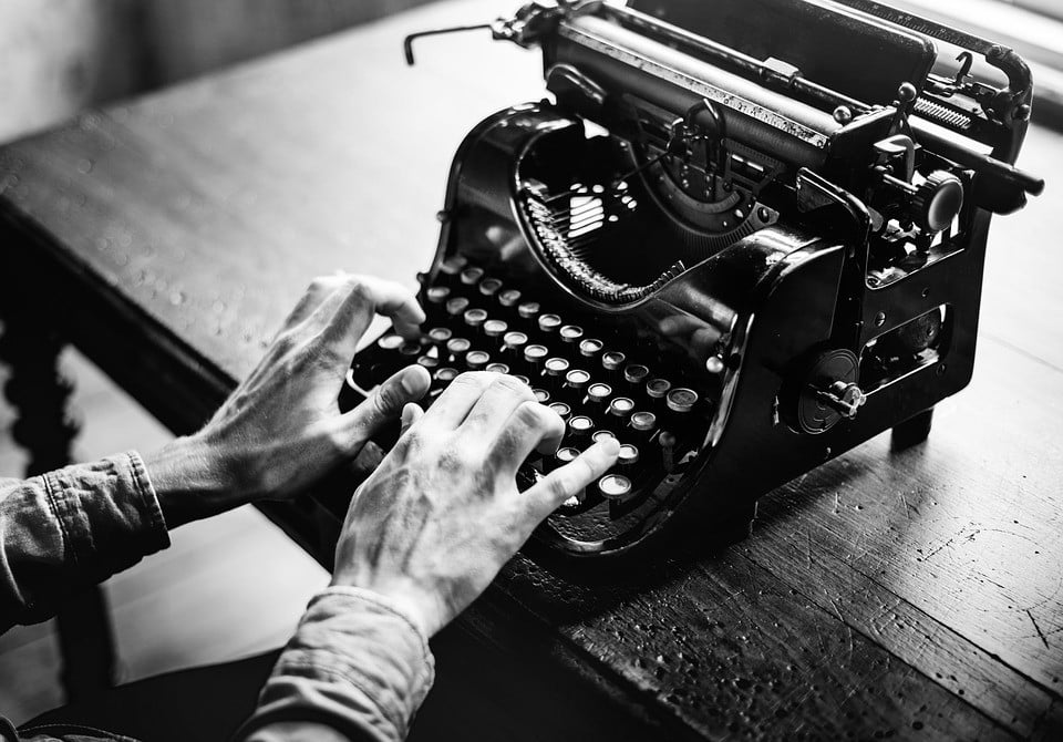 Typewriting hands telling a story