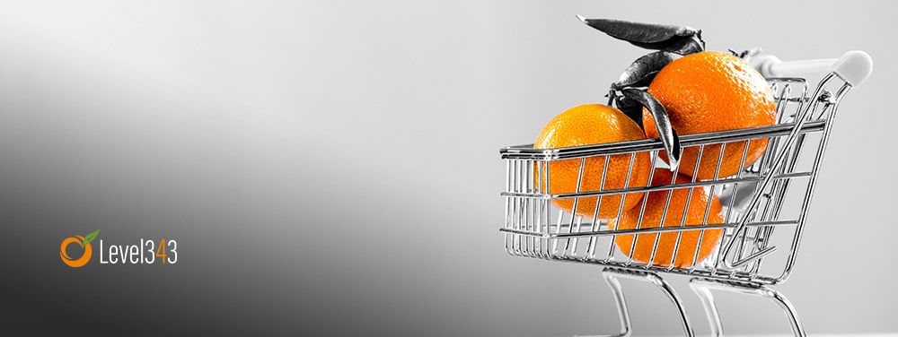 Shopping cart with oranges