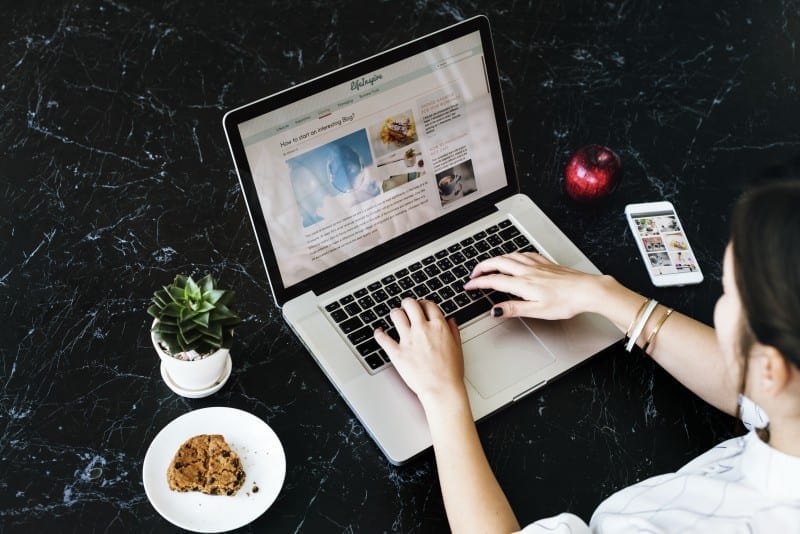 Woman Blogging on her computer